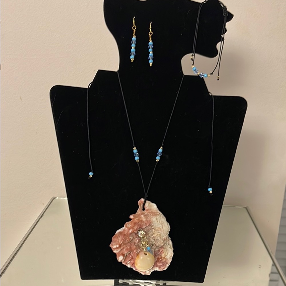 Blue and Black Necklace with Striking Pendant